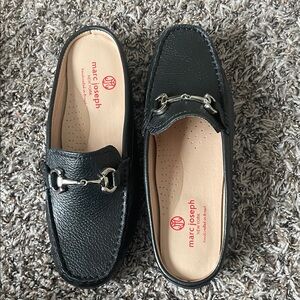 Marc Joseph Black Leather Slip-Ons with Silver Detail